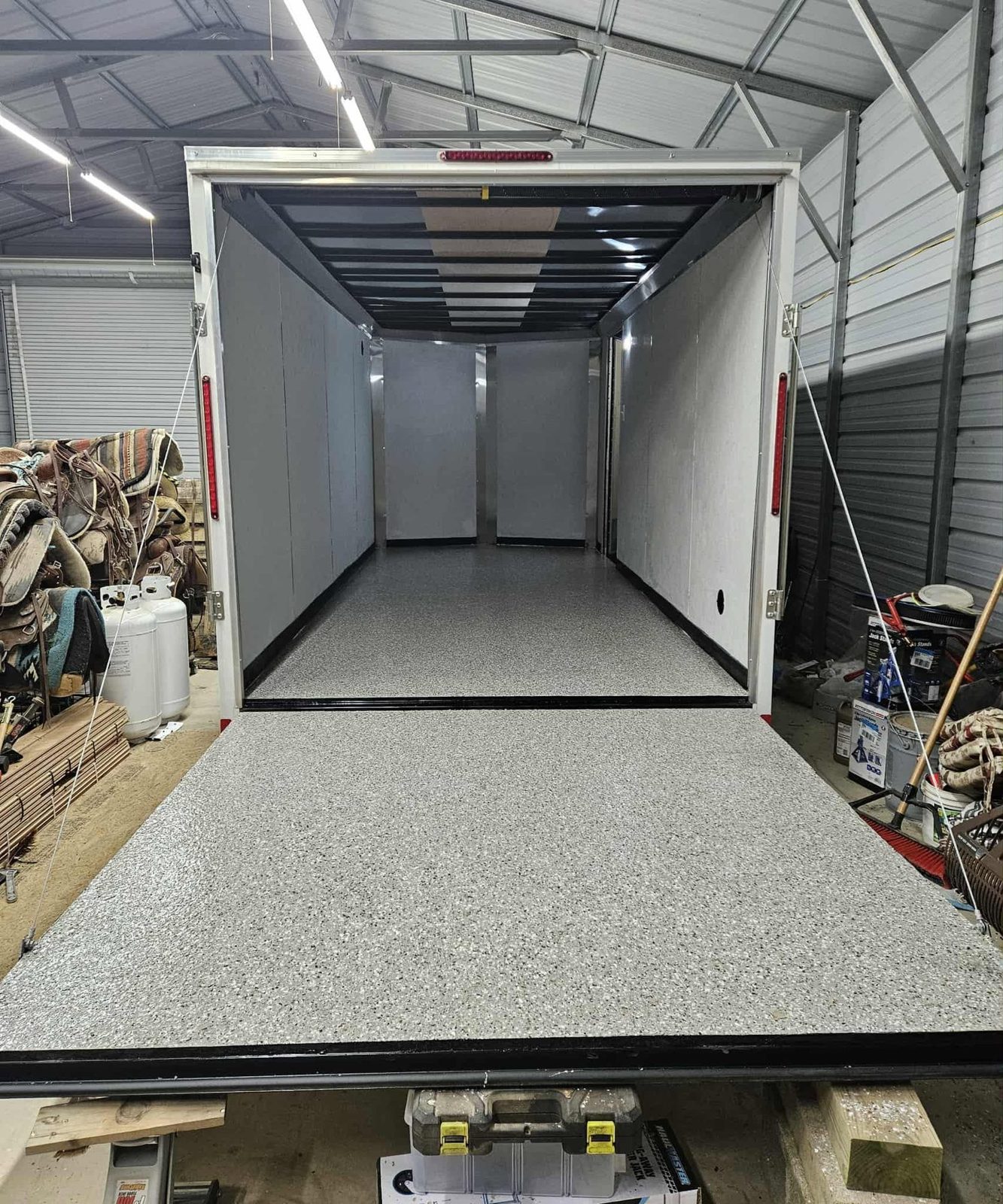 Enclosed cargo trailer with gray flake floor coating in Martinsburg, WV