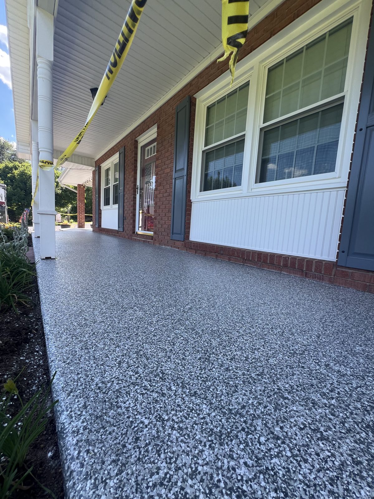 Front porch with gray flake coating in Martinsburg, WV