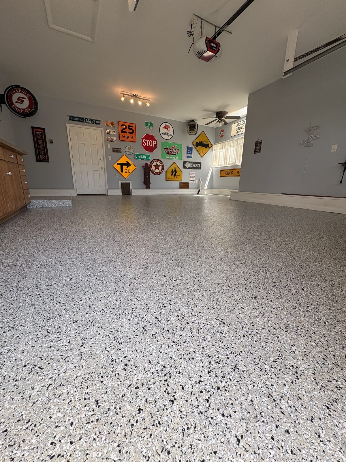 Man cave garage floor after white and black flake coating in Martinsburg, WV